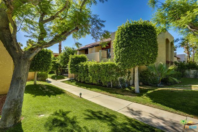Property Photo:  200 E Racquet Club Road 50  CA 92262 