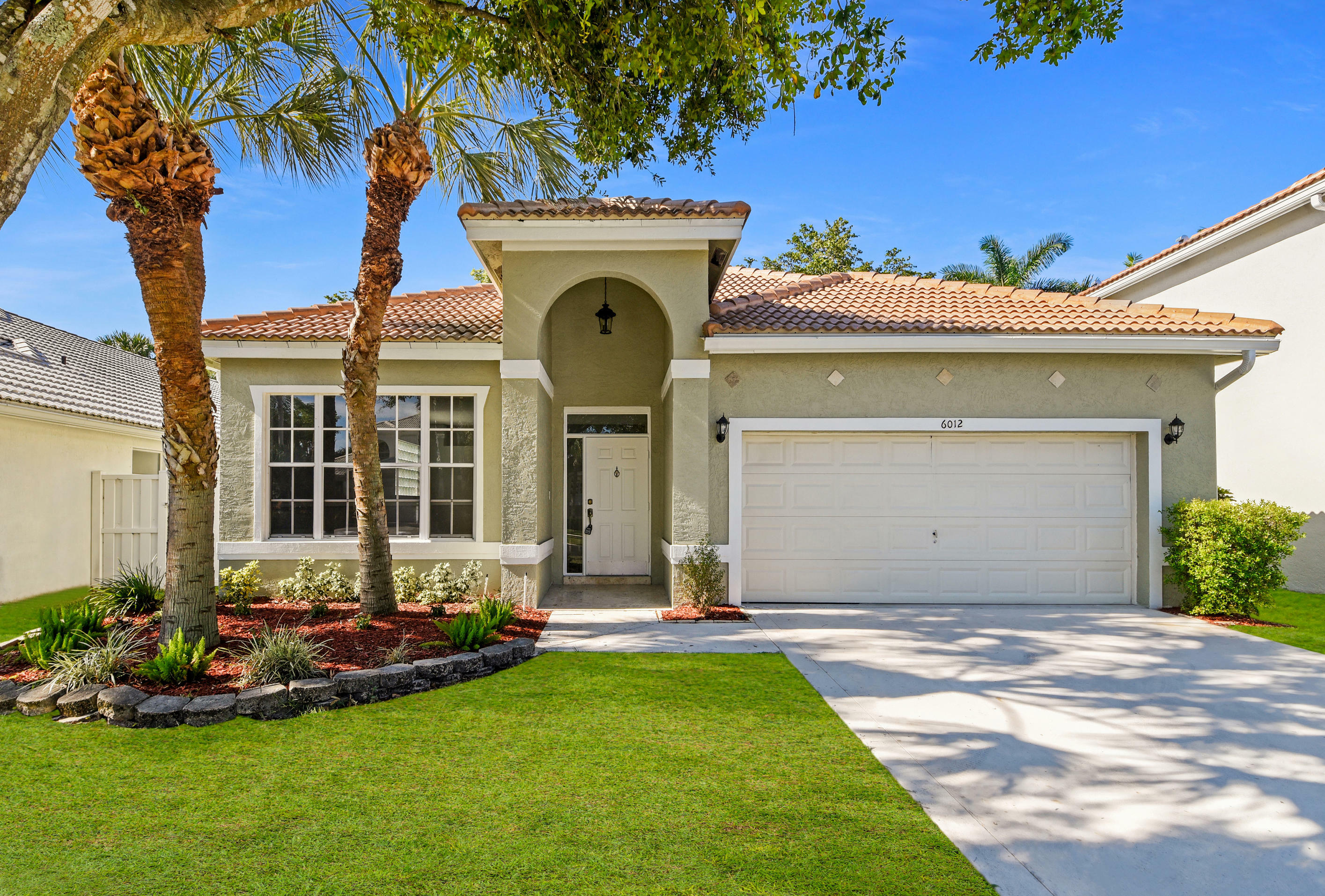 Property Photo: 6012 Newport Village Way FL 33463