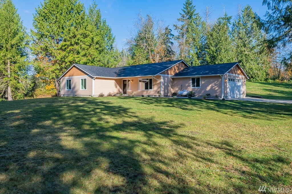 Property Photo:  9225 NE Countrywoods Lane  WA 98346 