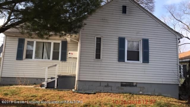 Property Photo:  1820 Alpha Street  MI 48910 