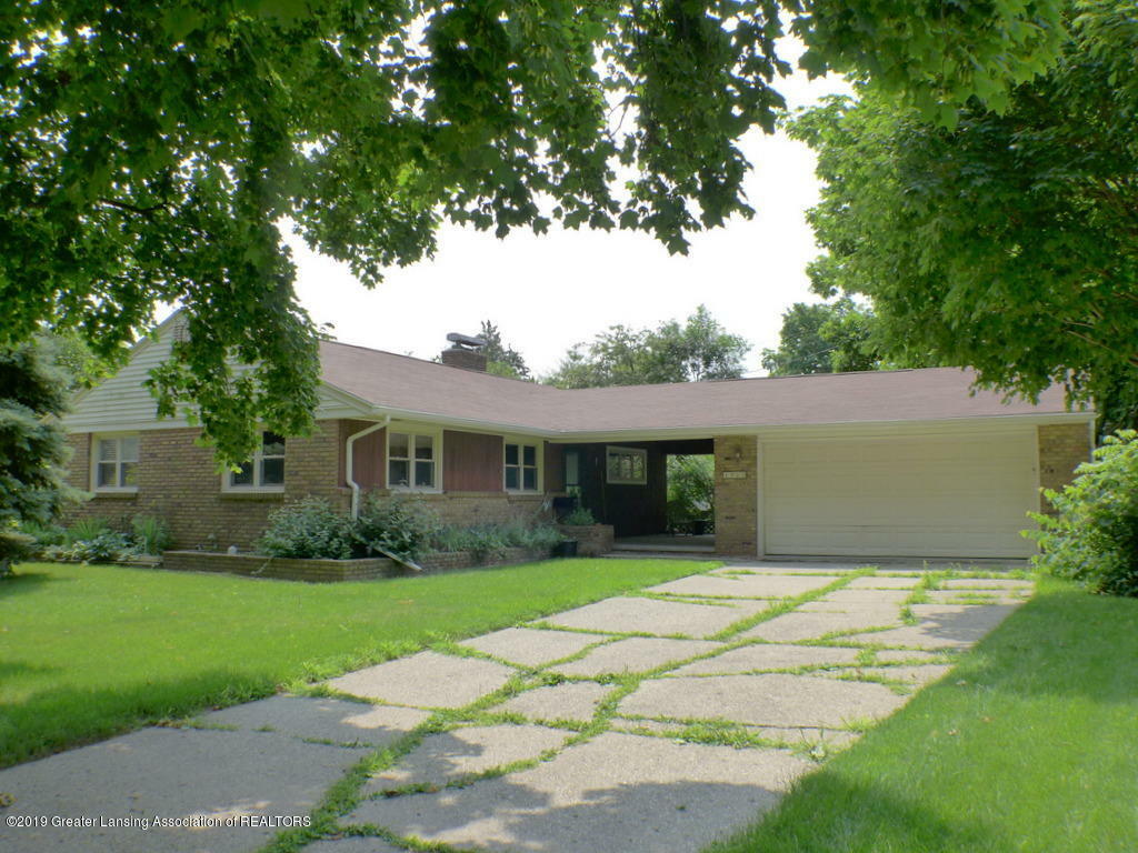 Property Photo:  1723 Windsor Place  MI 48910 