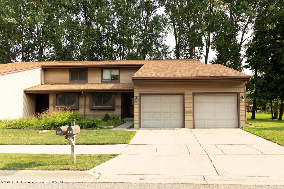 Property Photo:  2023 Greenwich Court  MI 48910 