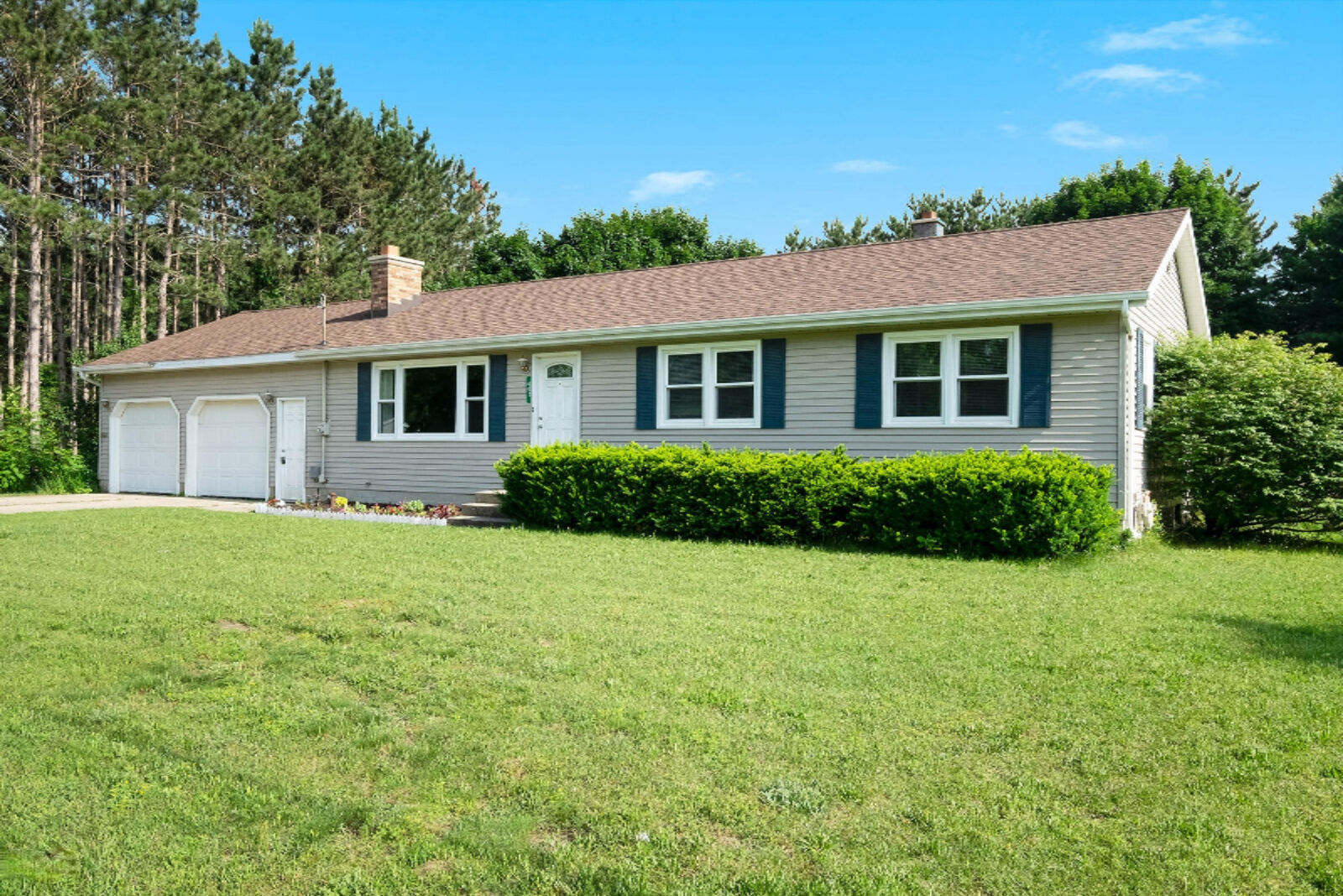 Property Photo:  405 Hill Lake Avenue  MI 49348 