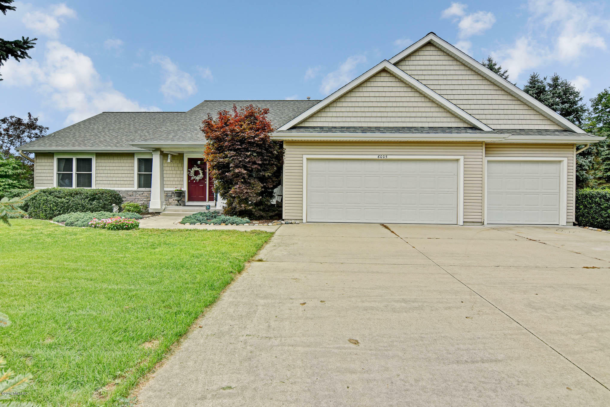Property Photo:  6005 River Ridge Drive  MI 49419 
