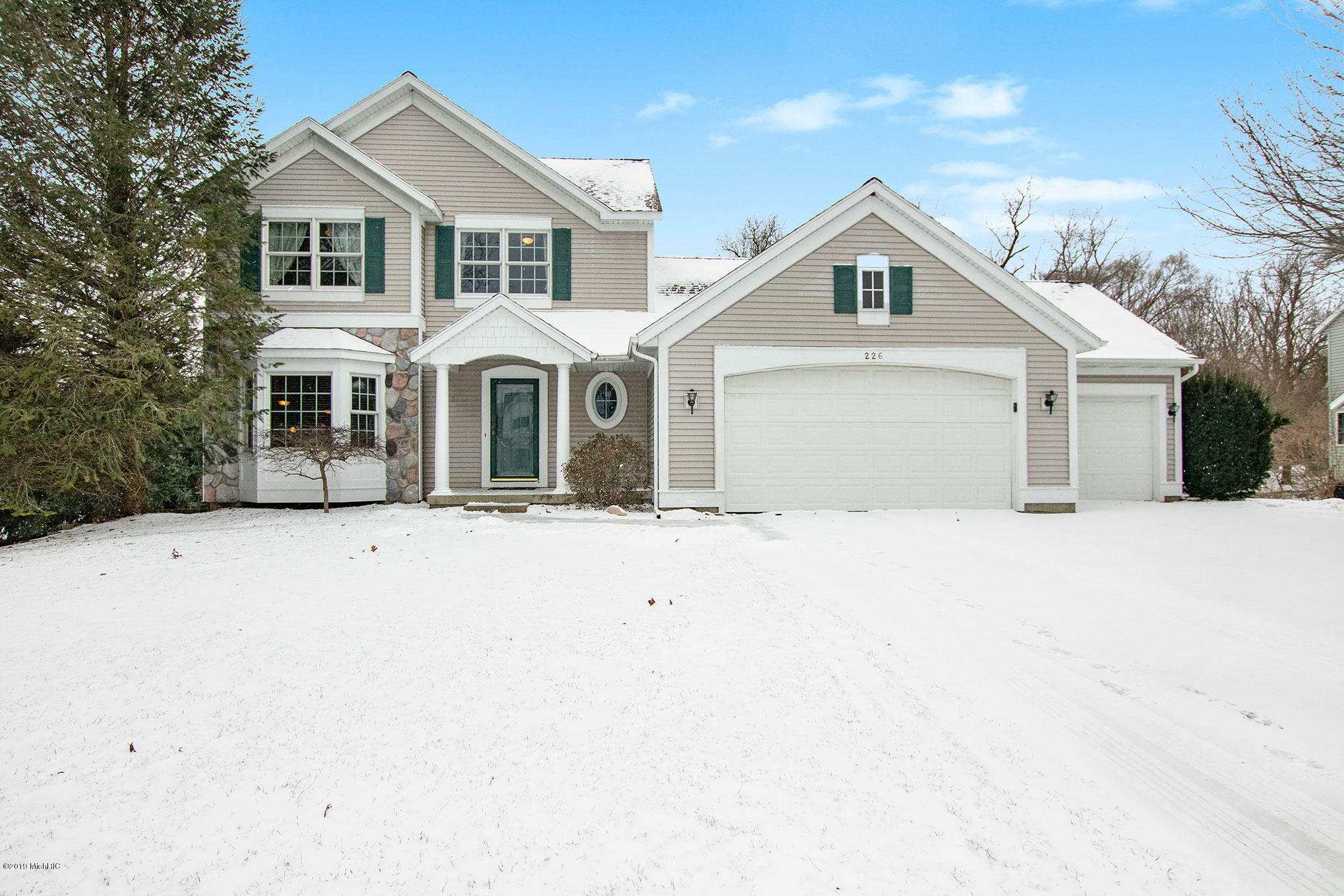 Property Photo:  226 Sun Meadow Court  MI 49424 