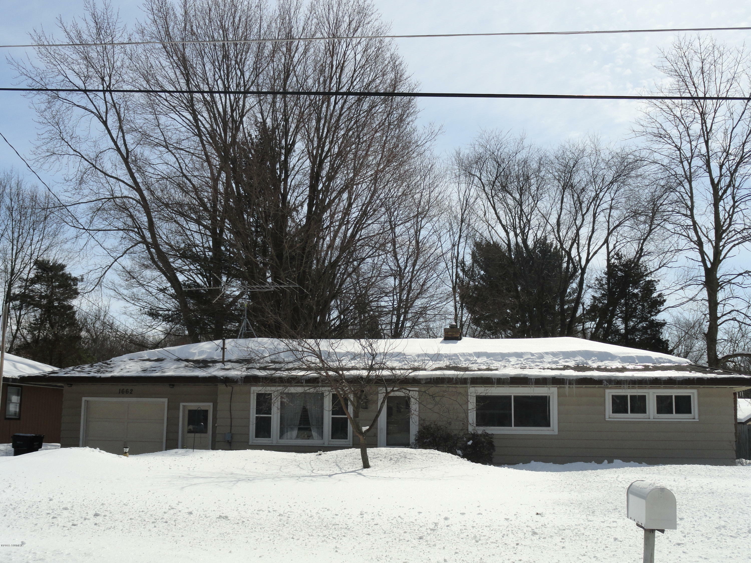 Property Photo:  1662 Vans Boulevard  MI 49423 