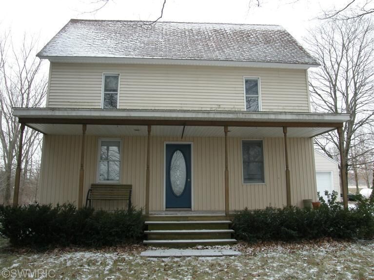Property Photo:  9351 Laubach Avenue NW  MI 49345 