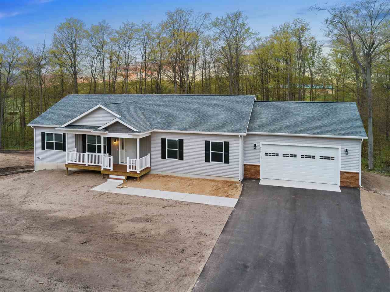 Property Photo: 959 Windsong Place Lot 46 MI 49770