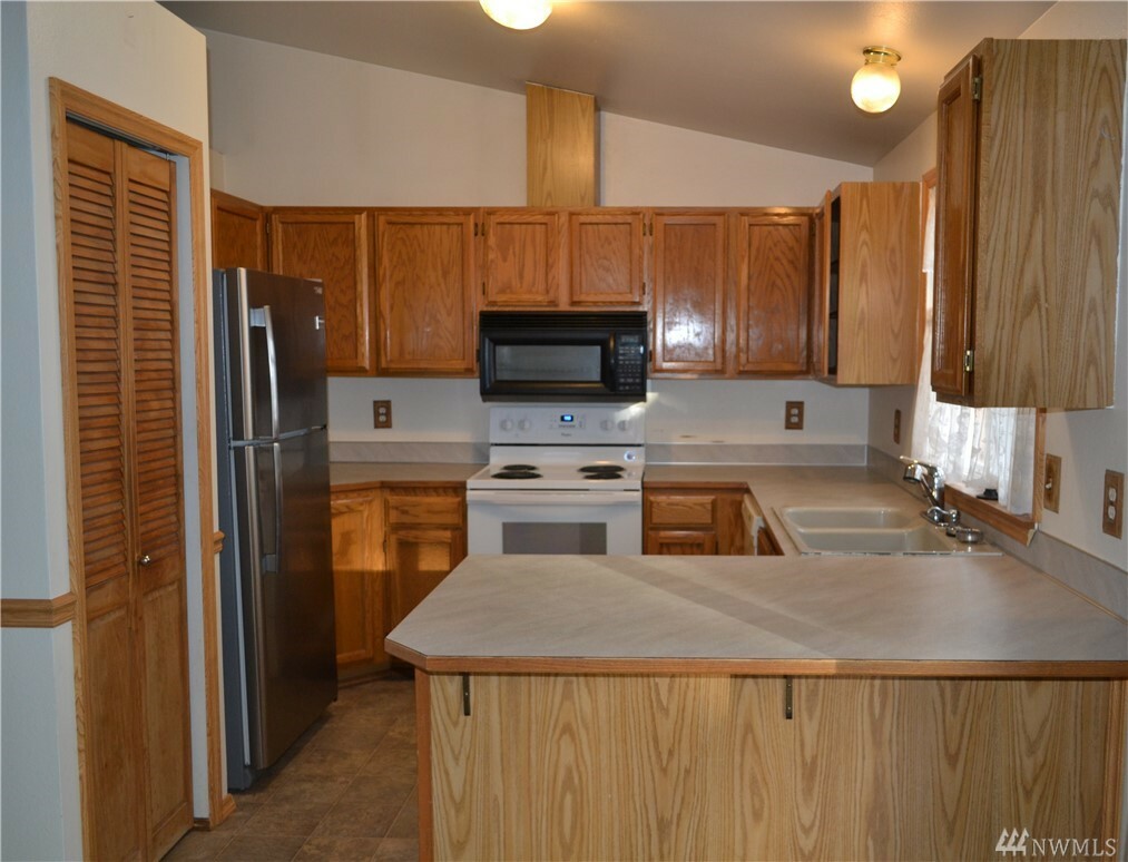 Property Photo: 1411 128th Dr NE 10A WA 98258
