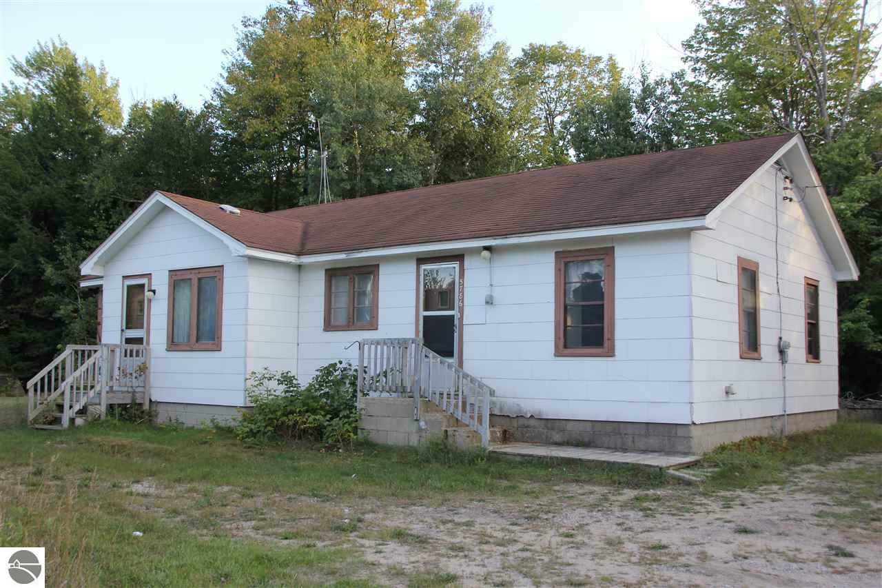 Property Photo:  5786 E Duck Lake Road  MI 49653 