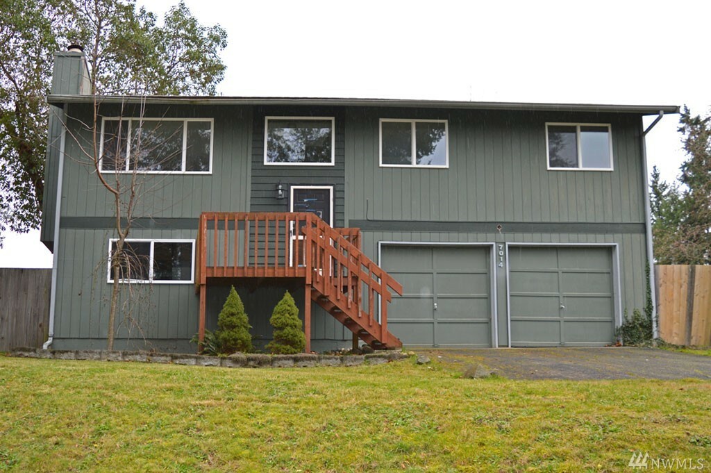 Property Photo:  7014 Locust Ave E  WA 98391 