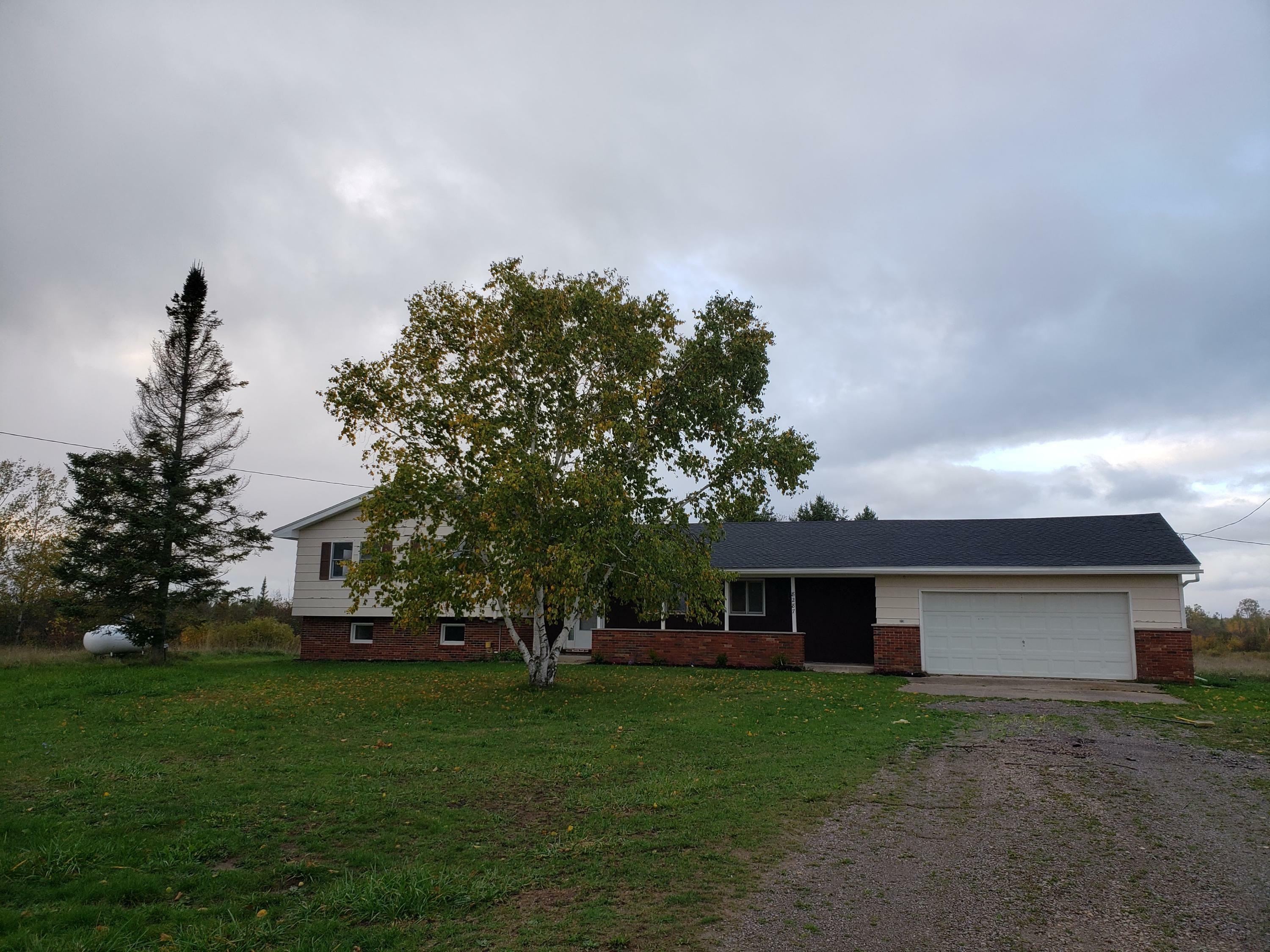 Property Photo:  8287 Page Road  MI 49721 