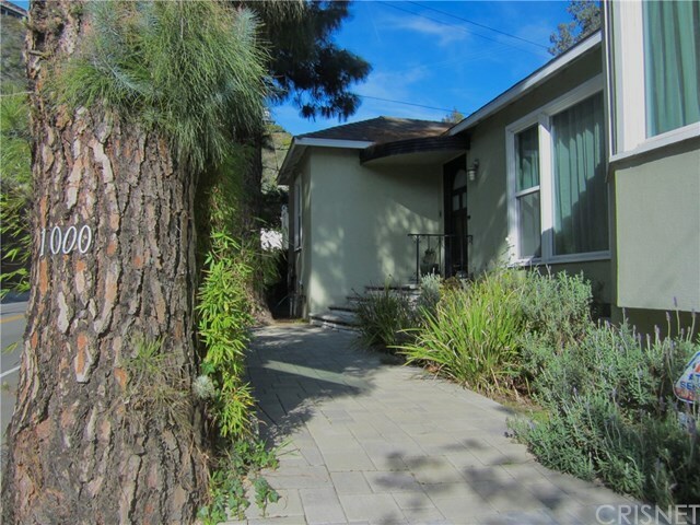 Property Photo:  1000 N Beverly Glen Boulevard  CA 90077 