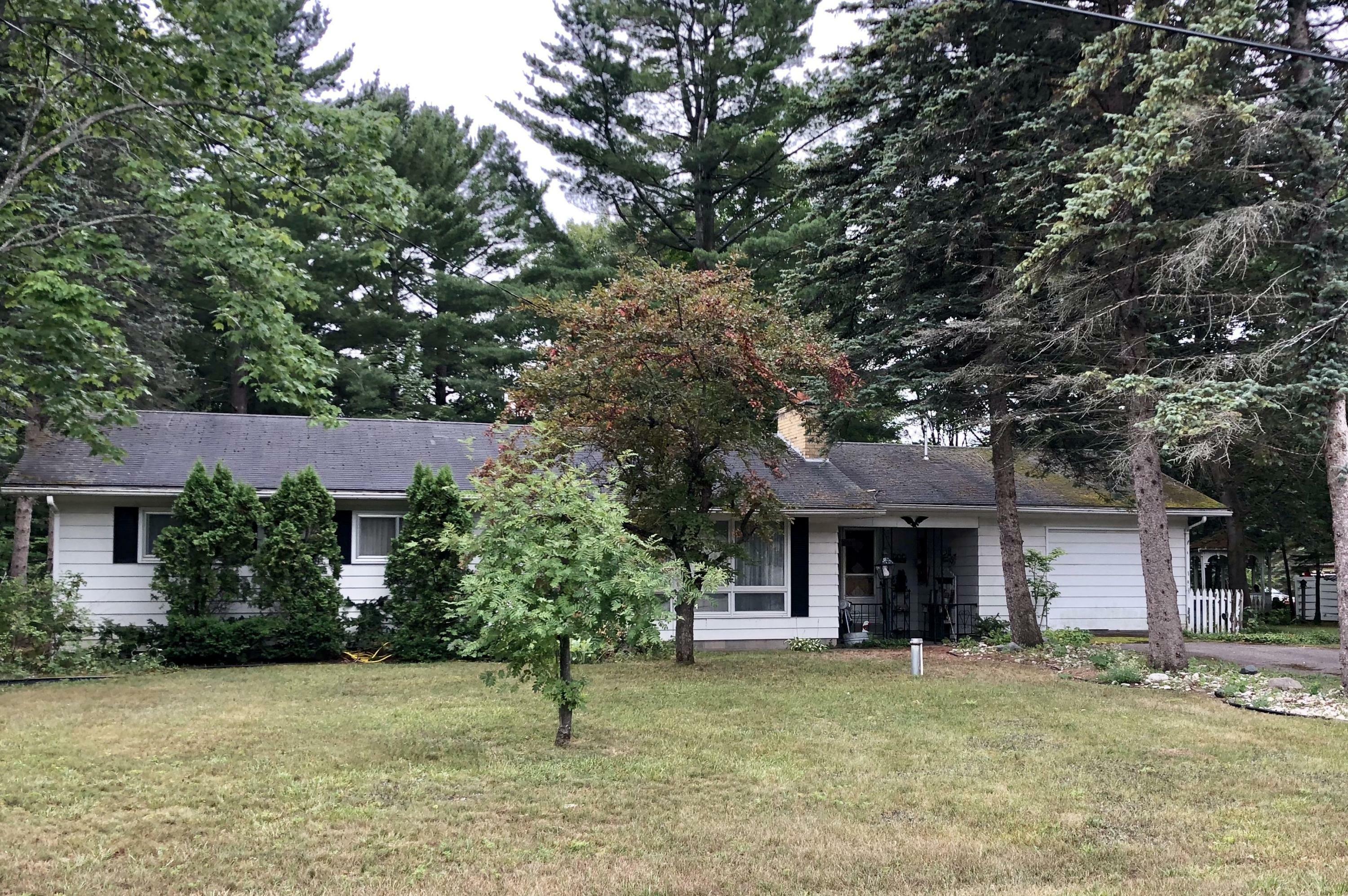 Property Photo:  6573 Burchfield Road  MI 49749 