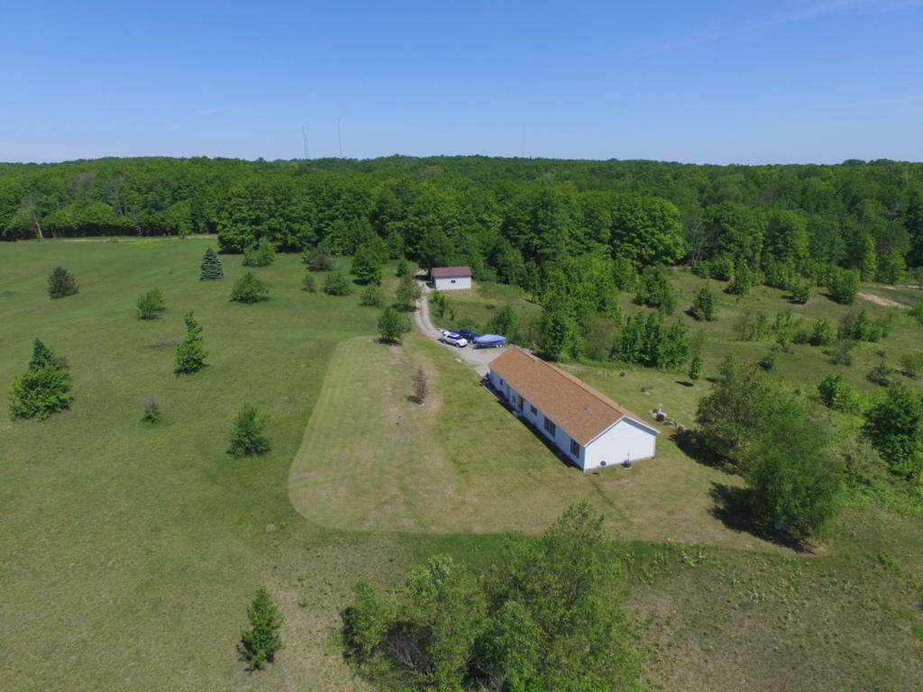 Property Photo:  5229 Dunham Road  MI 49799 