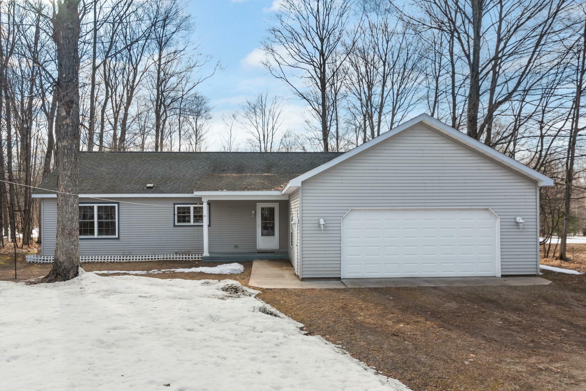 Property Photo:  1064 Owen Drive  MI 49770 