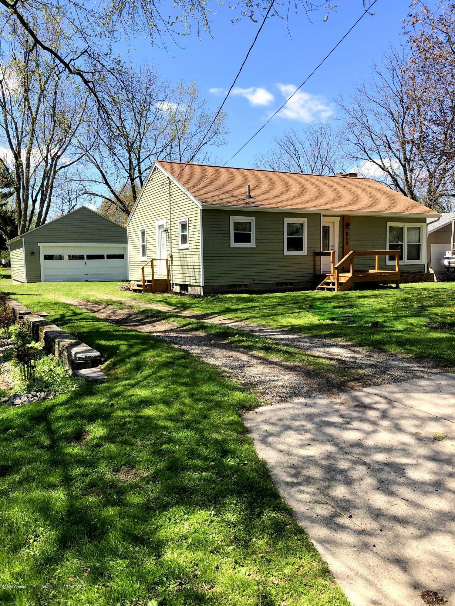 Property Photo:  633 Forest Street  MI 48813 