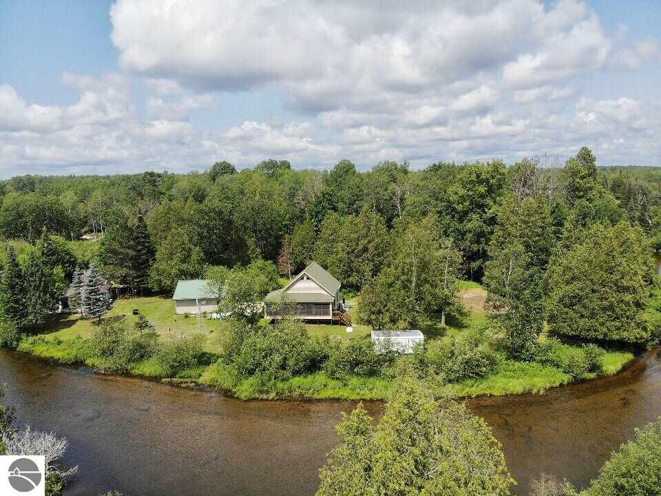 Property Photo:  8353 SE Spruce Court  MI 49633 
