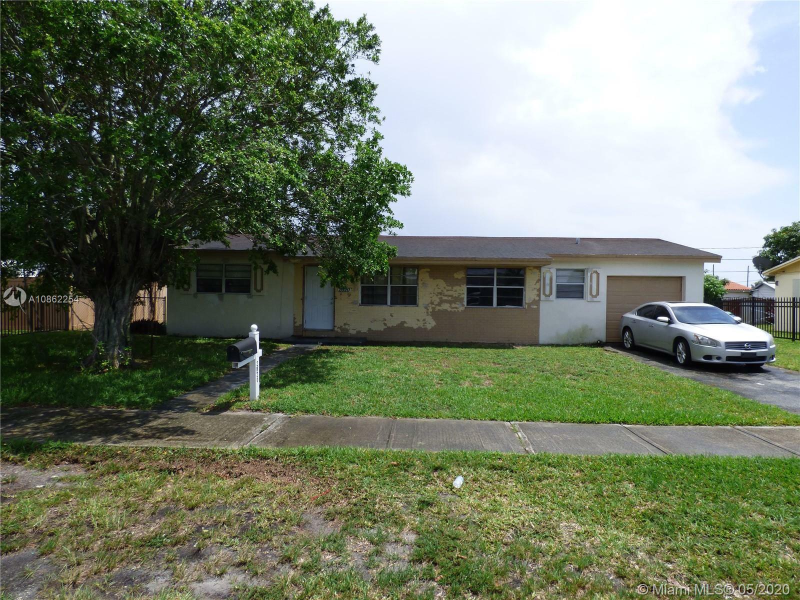 Property Photo: 2820 NW 212th Ter FL 33056