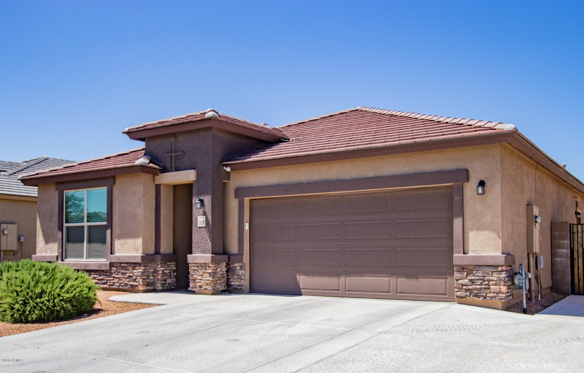 Property Photo:  13568 W Desert Moon Way  AZ 85383 