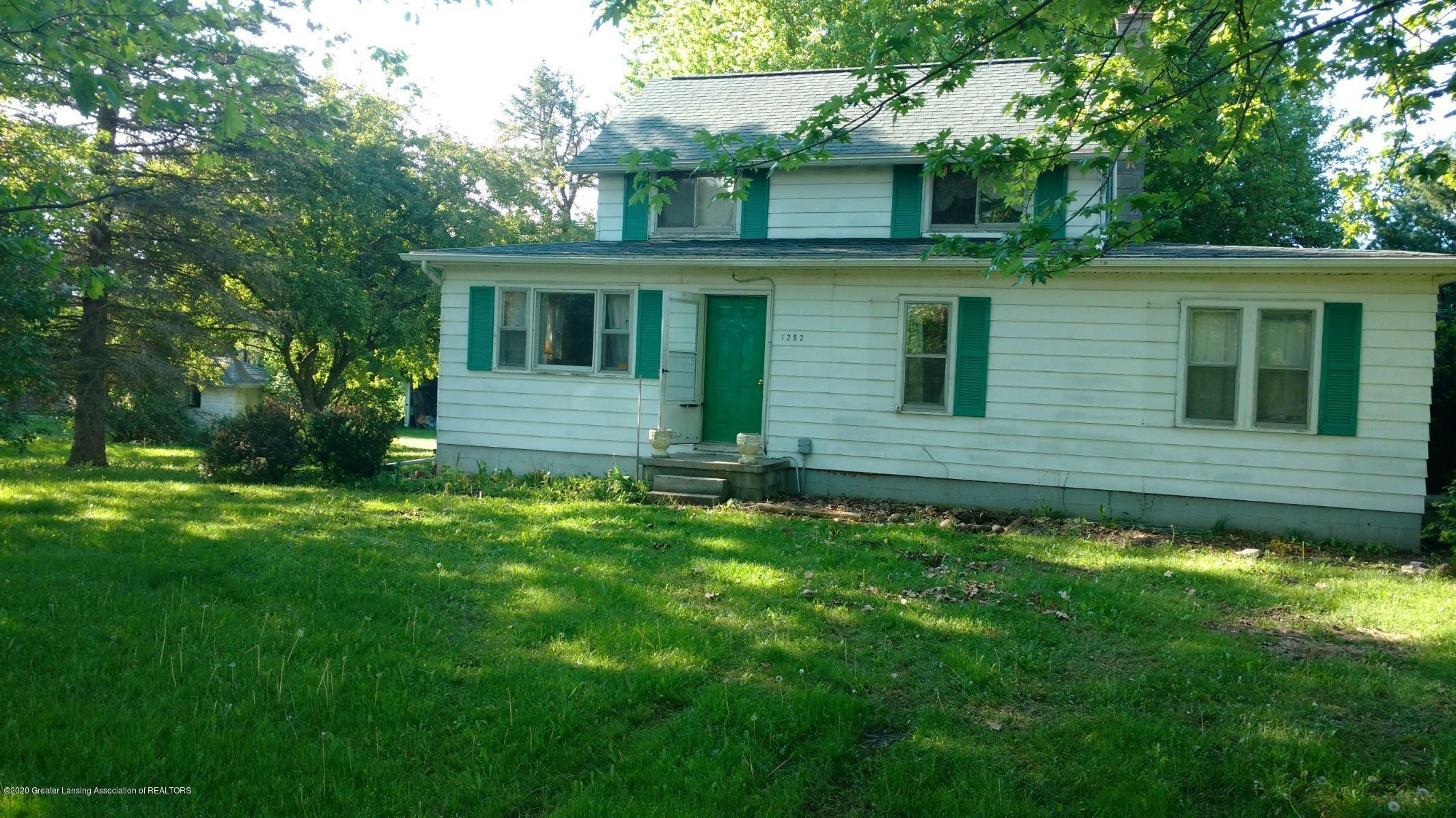 Property Photo:  1292 Holt Road  MI 48854 