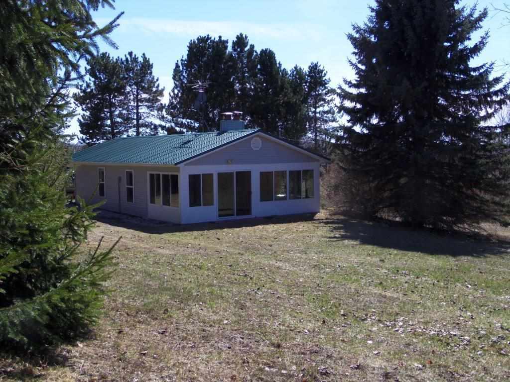 Property Photo:  08305 Quarterline  MI 49720 