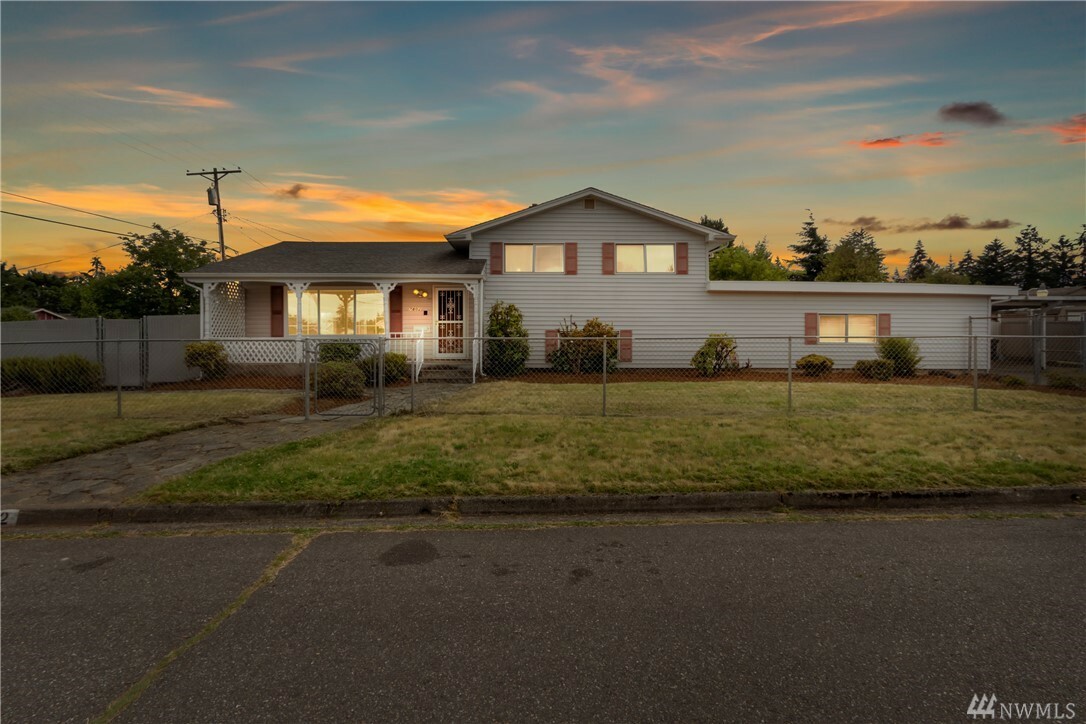 Property Photo:  7802 S Ainsworth Ave  WA 98408 