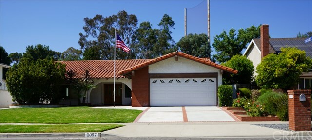 Property Photo:  2097 Smokewood Avenue  CA 92831 