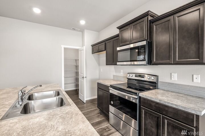 Property Photo:  18218 107th Ave E 448  WA 98374 