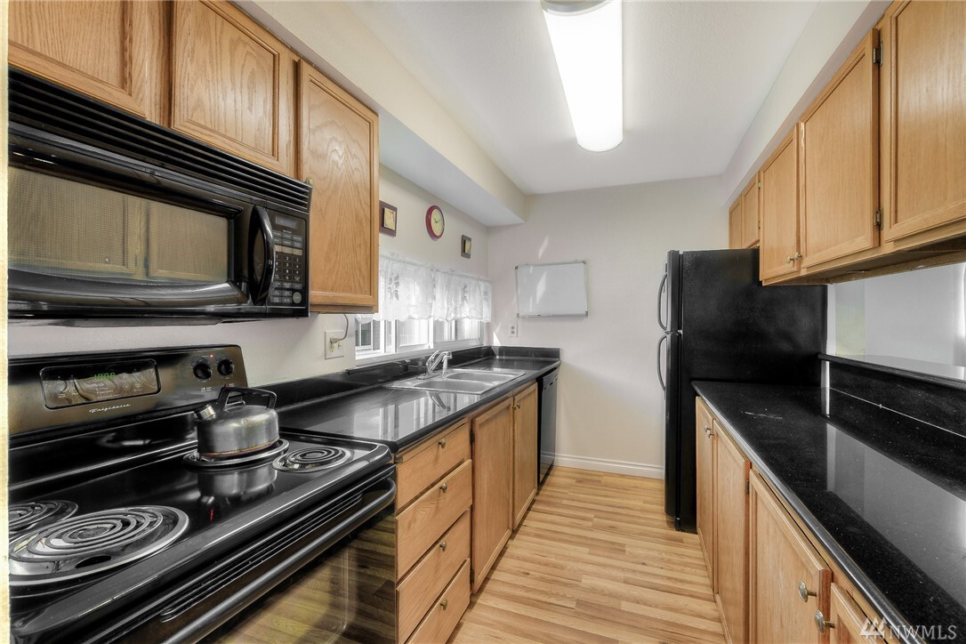 Property Photo: 22226 24th Avenue S J67 WA 98198