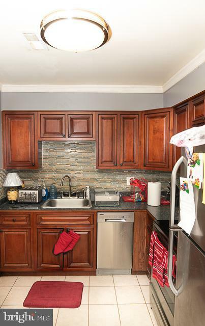 Property Photo:  10110 Campus Way S 102-8A  MD 20774 