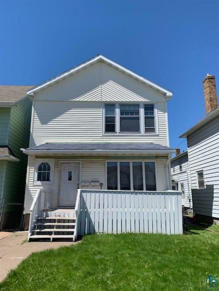 Property Photo:  1305 Hammond Ave  WI 54880 