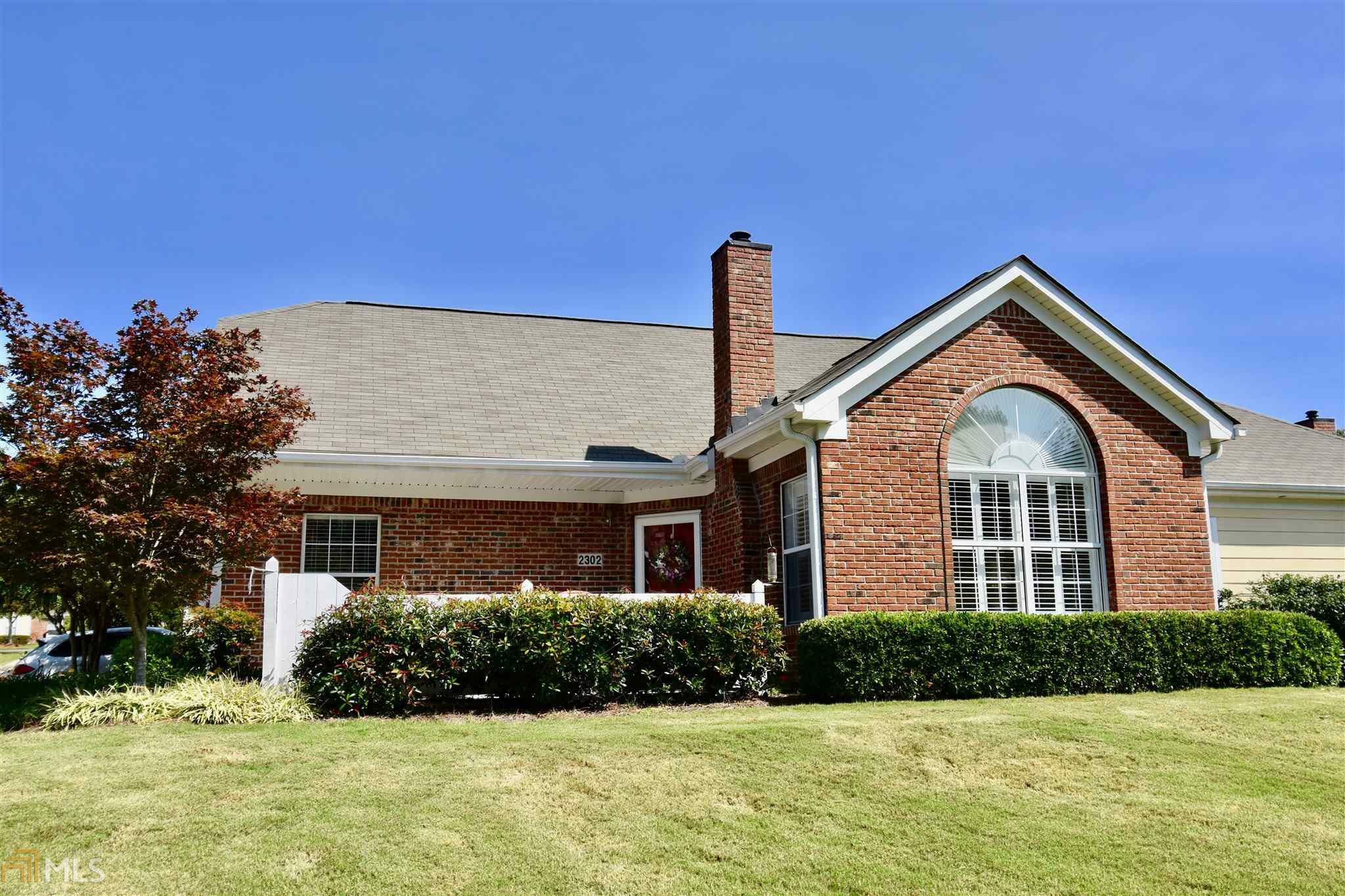 Property Photo:  2191 Rockbridge Road 2302  GA 30087 