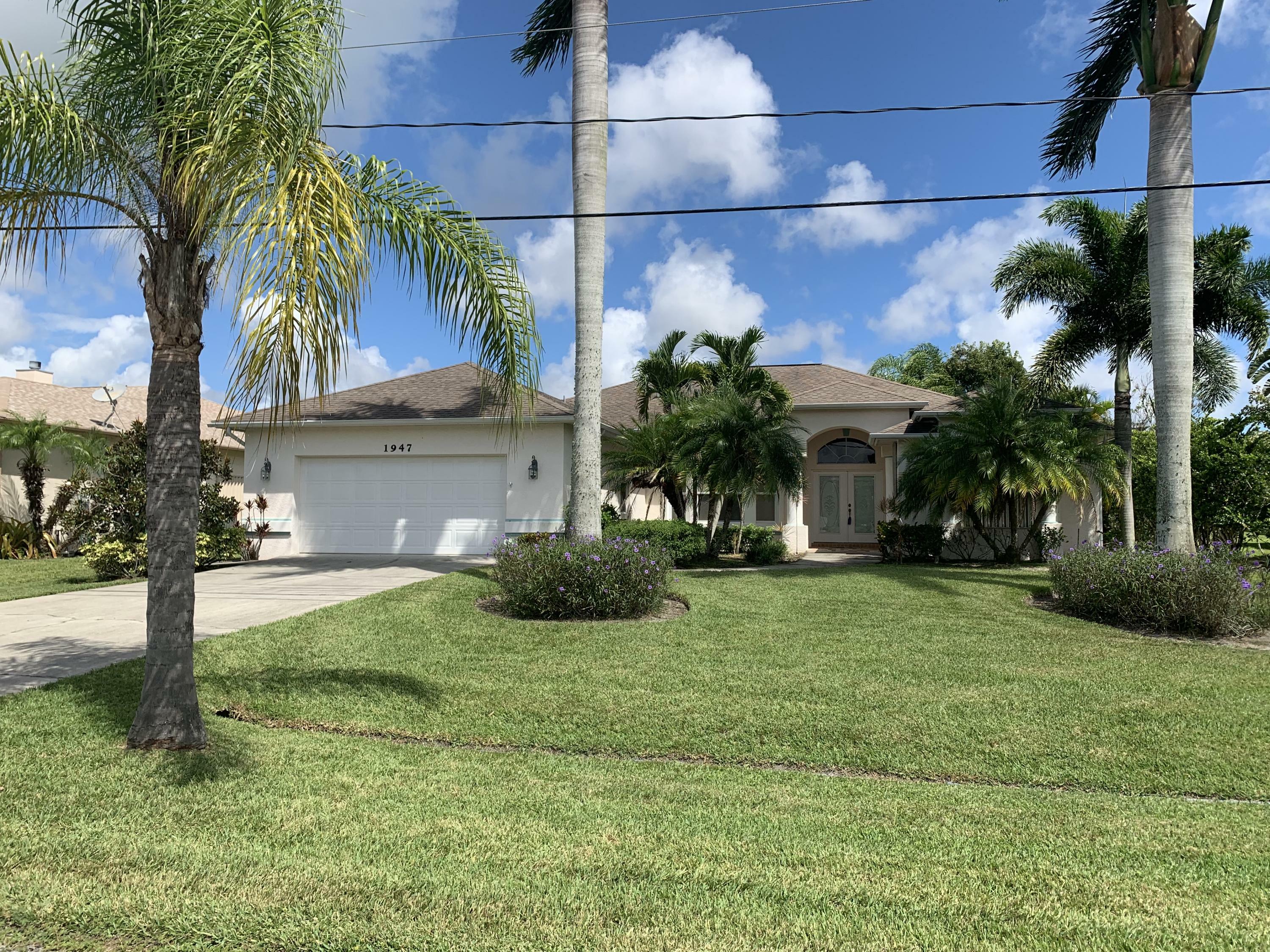 Property Photo:  1947 SW Import Drive  FL 34953 