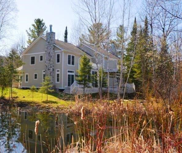 Property Photo:  3443 Lakeside Drive North  MI 49770 