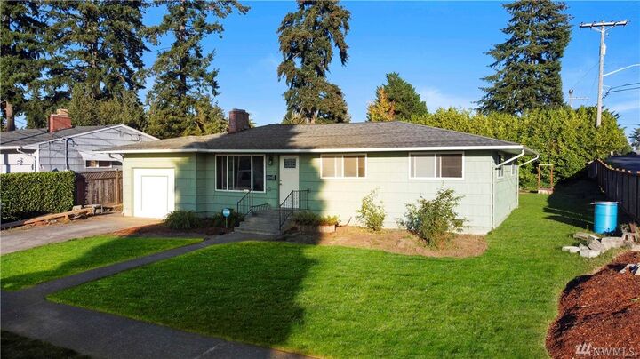 Property Photo: 7443 S Asotin St WA 98408