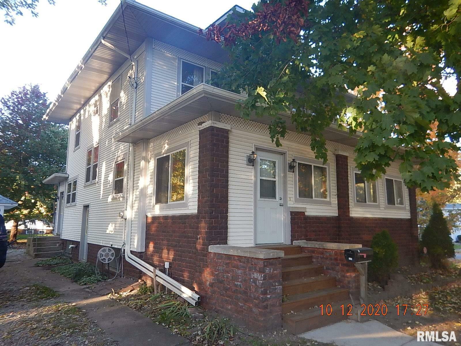Property Photo:  410 NW 5th  IL 61434 