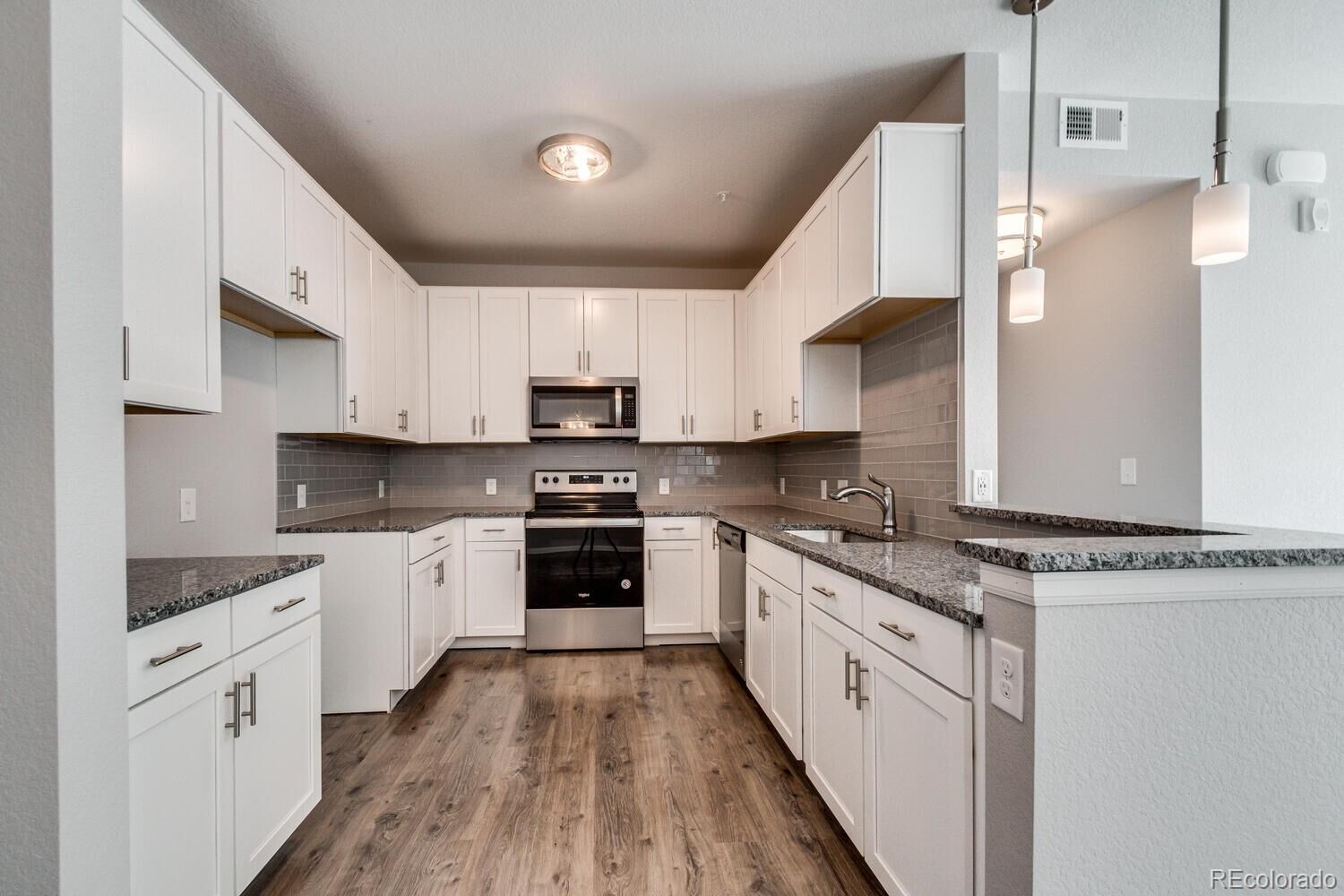 Property Photo: 15700 E Jamison Drive 104 CO 80112