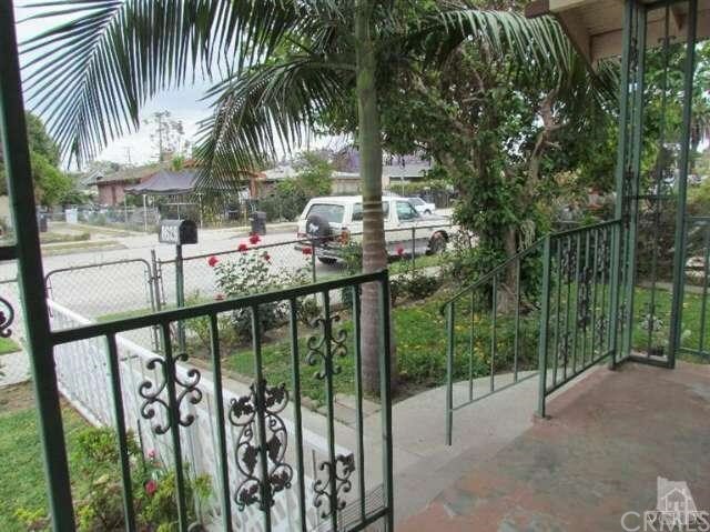 Property Photo:  8629 Grape Street  CA 90002 