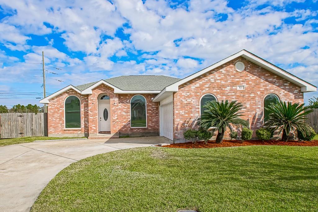 Property Photo:  65 Sawgrass Drive  LA 70068 