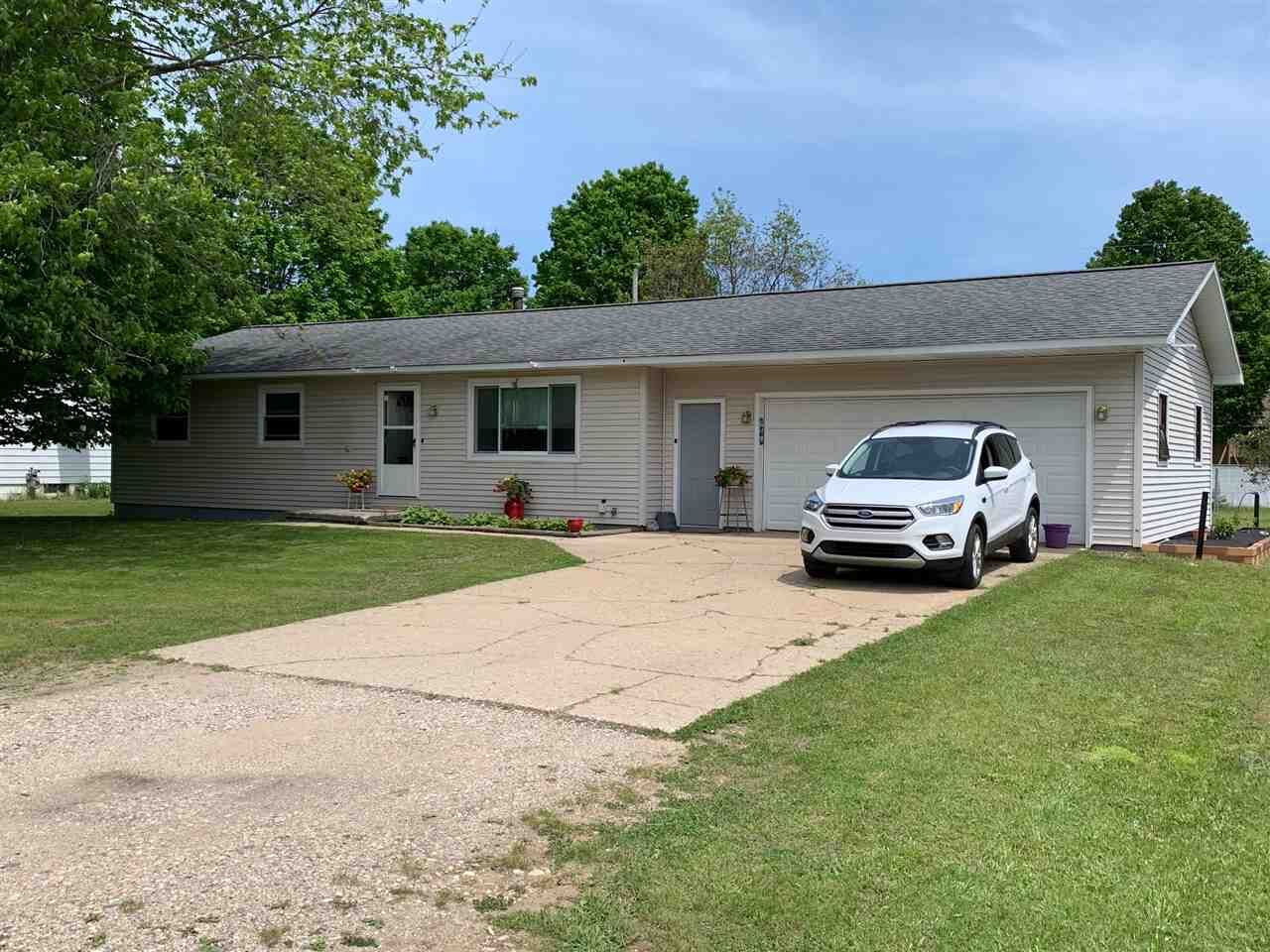 Property Photo:  404 Hillview  MI 49659 