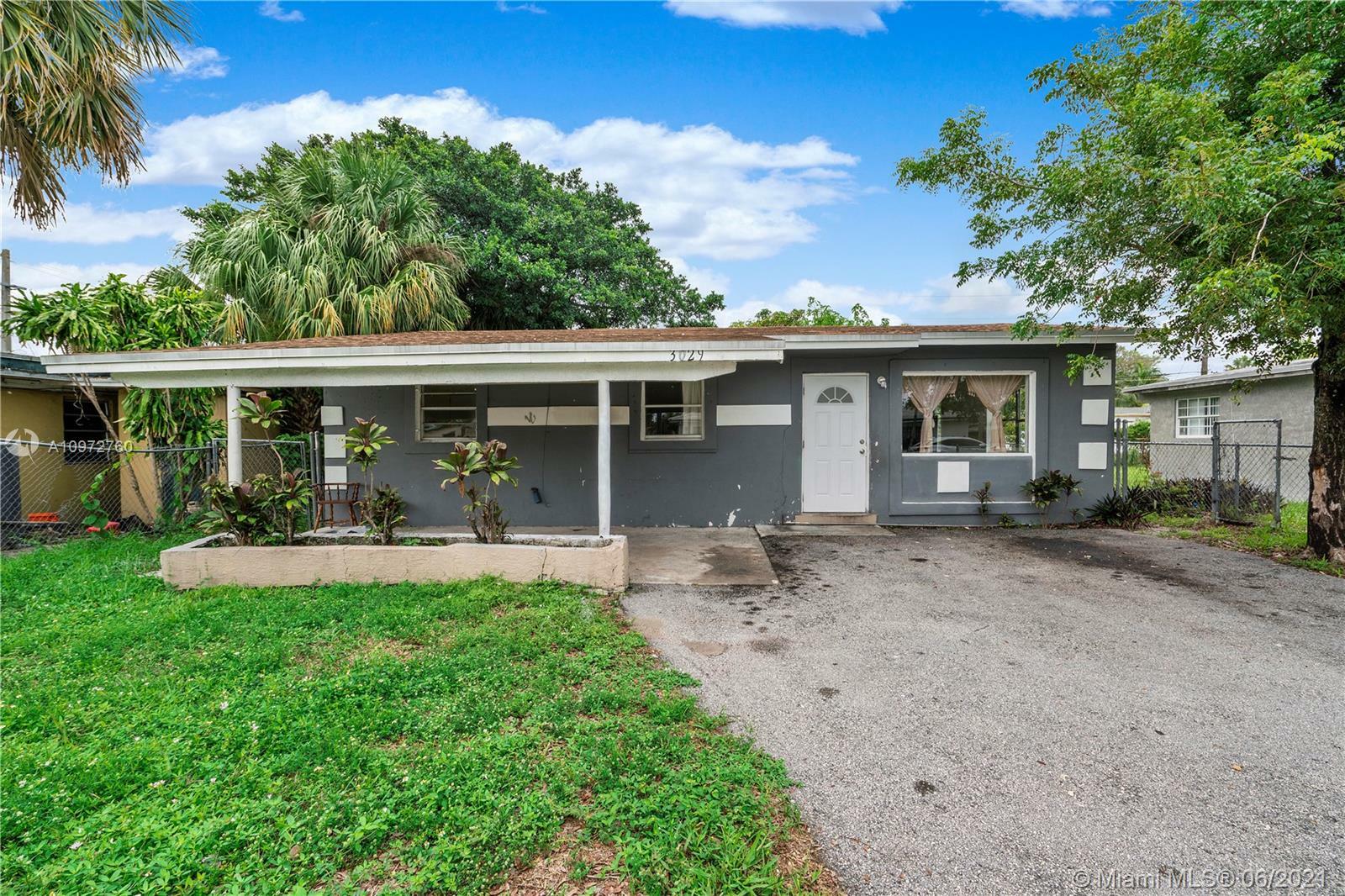 Property Photo:  3029 NW 8th Ct  FL 33311 