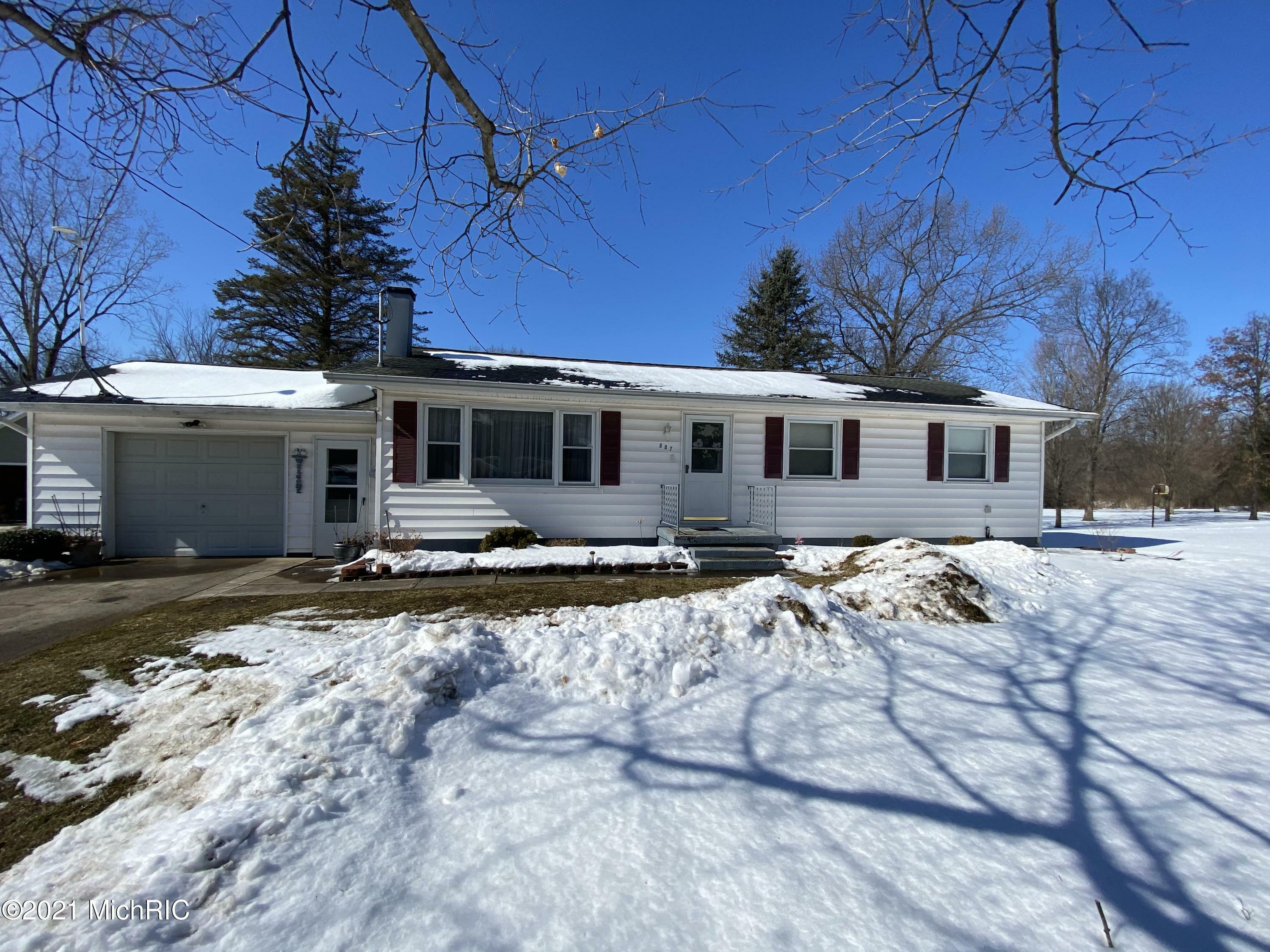 Property Photo:  687 Langs Drive  MI 49250 