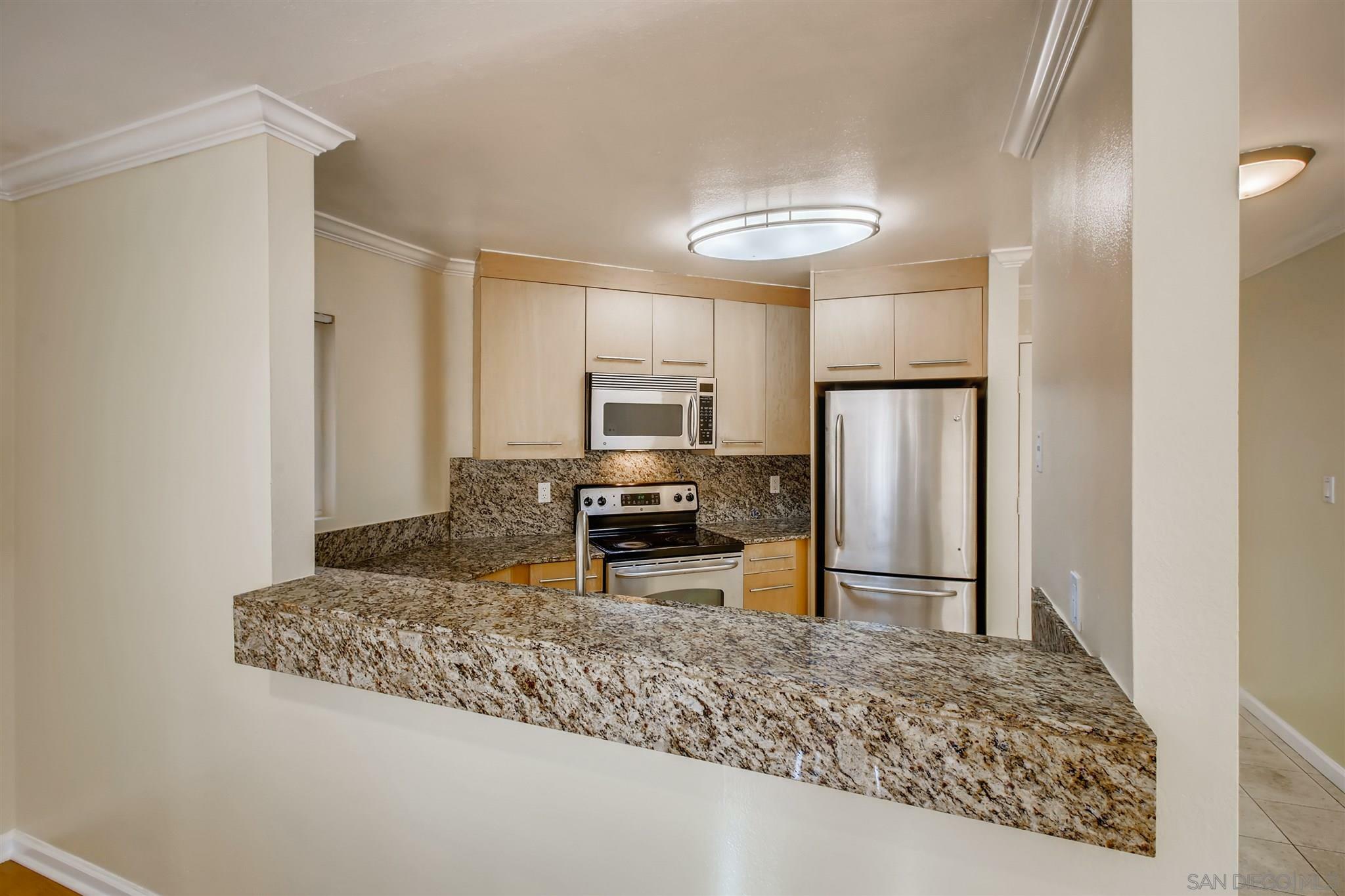 Property Photo:  7585 Charmant Dr Unit 806  CA 92122 