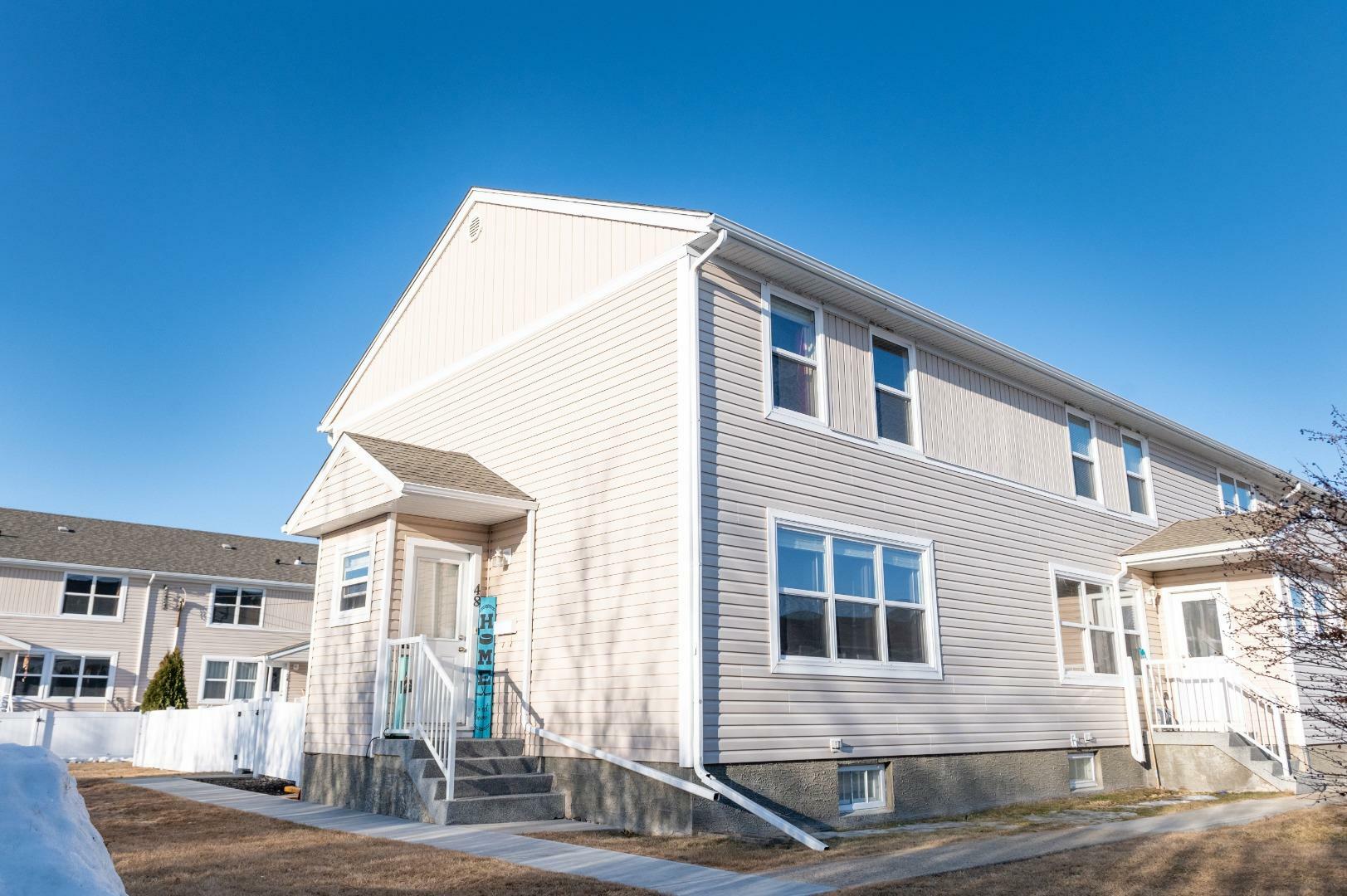 Property Photo: 48 Poplar Crescent AB T4S 1V4