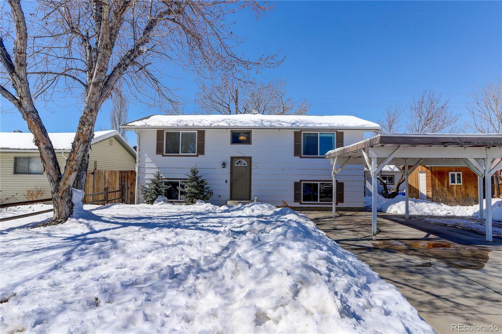 Property Photo: 1504 Carmelita Court CO 80651
