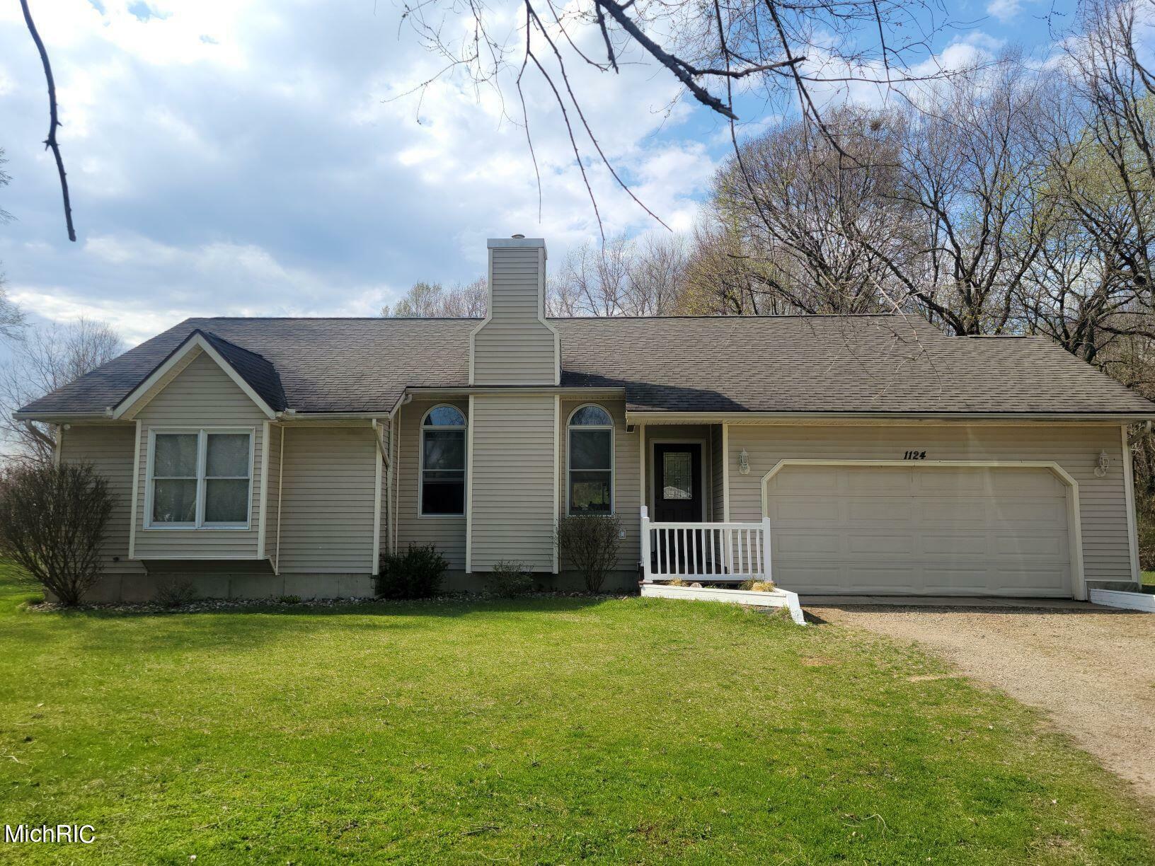 Property Photo:  1124 Tracy Drive  MI 49091 