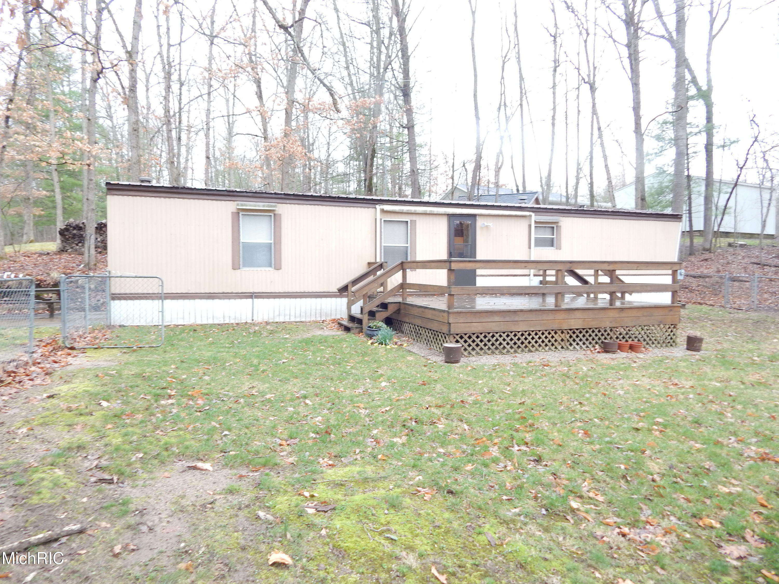 Property Photo:  6719 E Deerwood Drive  MI 49349 