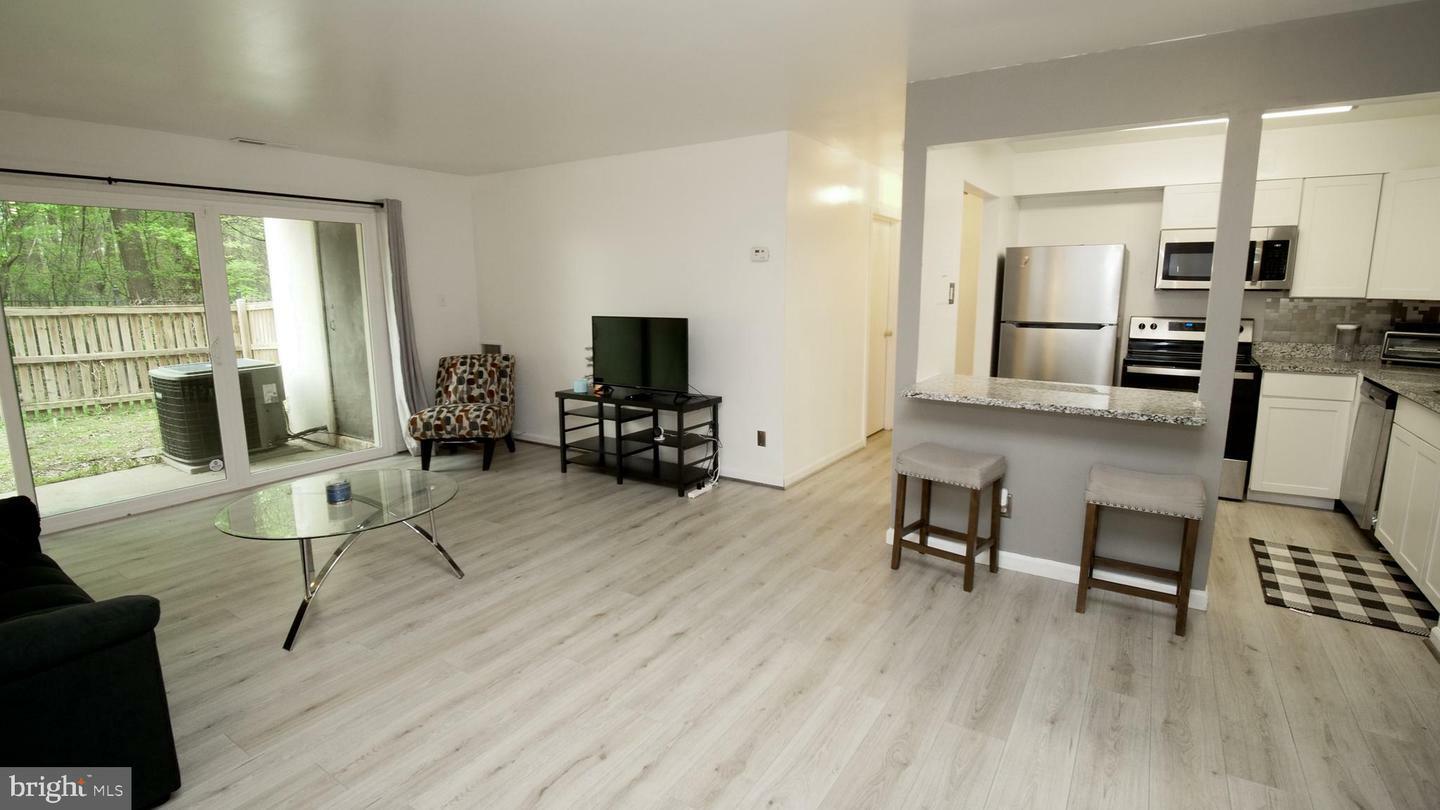 Property Photo:  10103 Prince Place 103-5A  MD 20774 