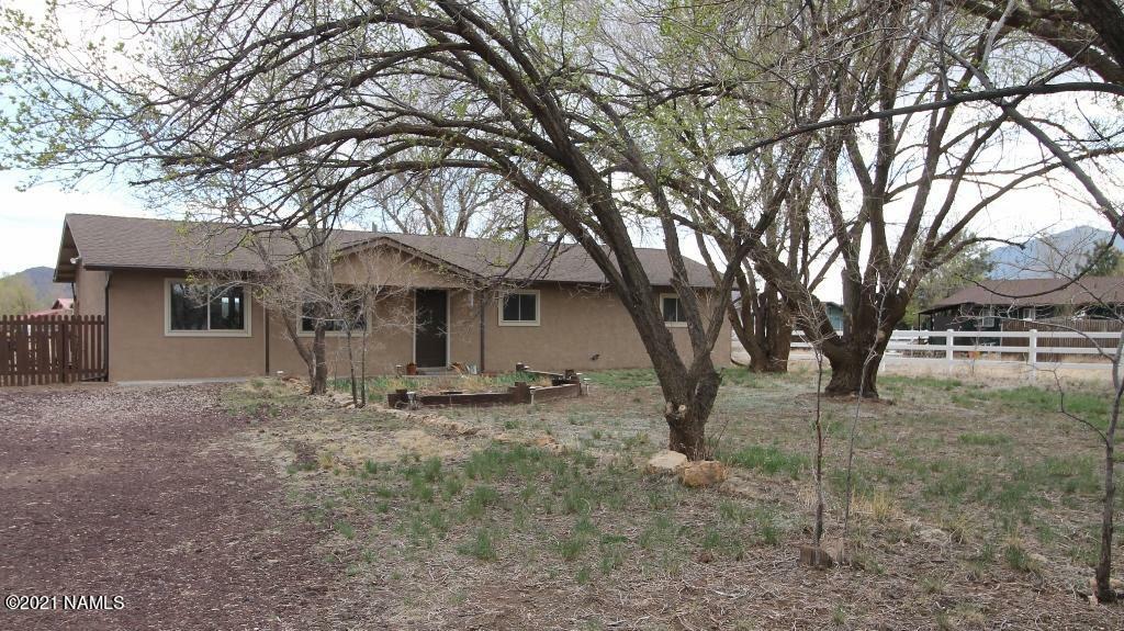 Property Photo:  7672 Saturn Drive  AZ 86004 